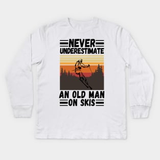 never underestimate an old man on skis Kids Long Sleeve T-Shirt